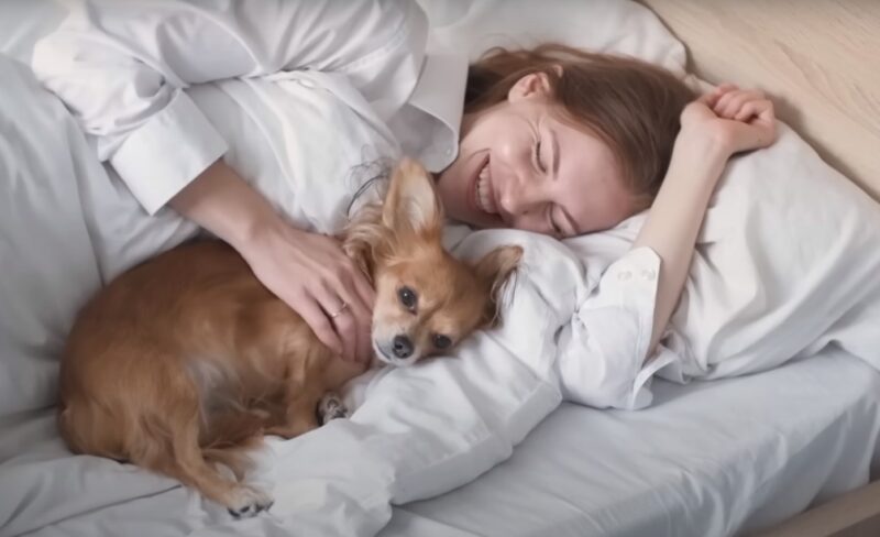 sleeping with dog